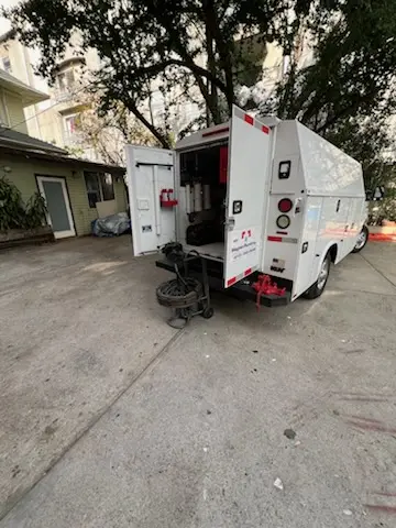 Magnet Plumbing service vehicle on-site for Water Heater Repair in Tide
